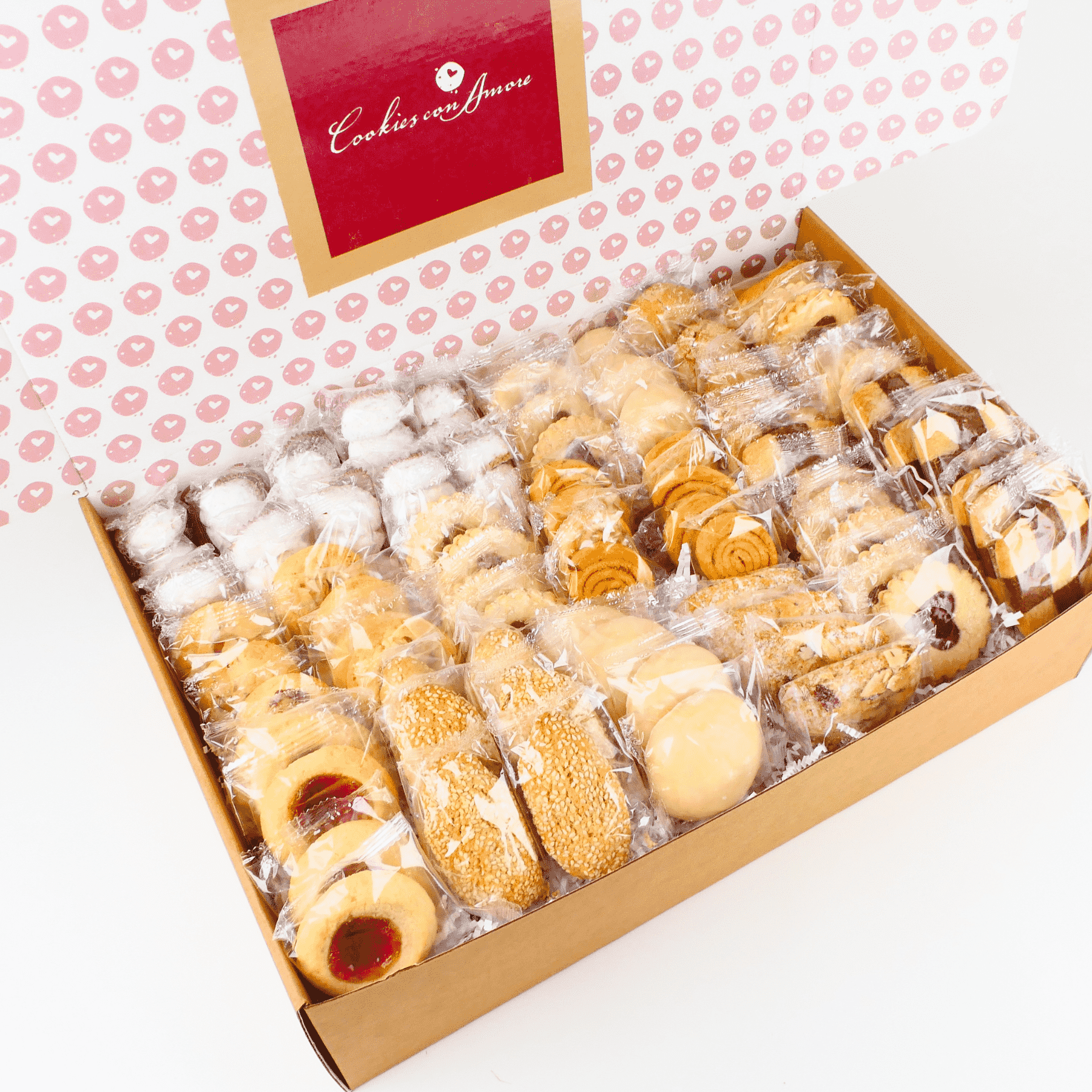 Box of assorted cookies with a visible brand logo on a patterned background