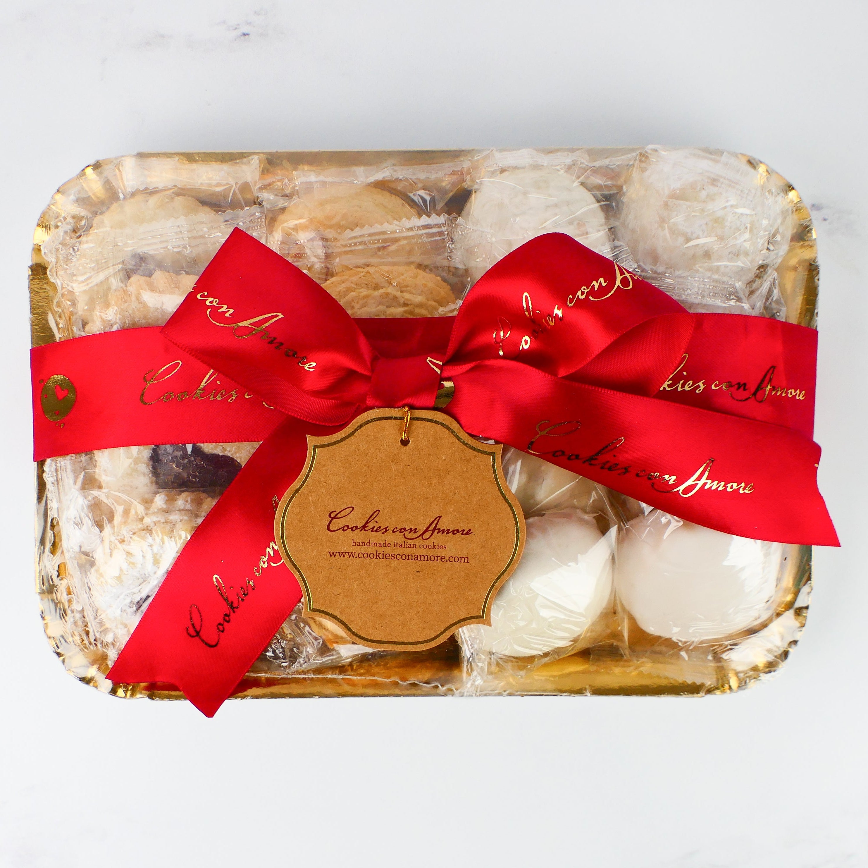 Packaged cookies with a red ribbon on a white background