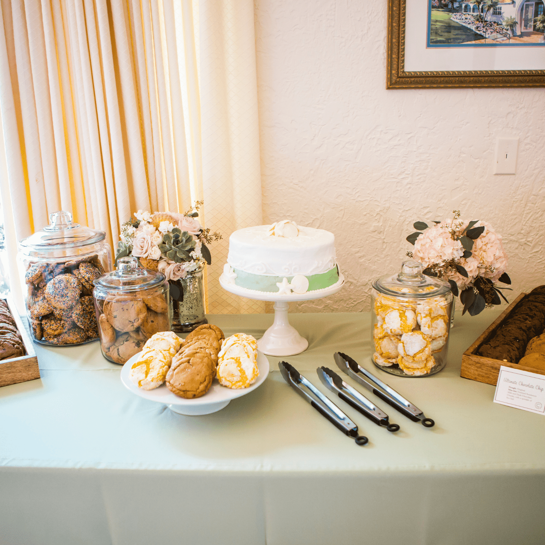 Wedding table with assorted cookies and desserts