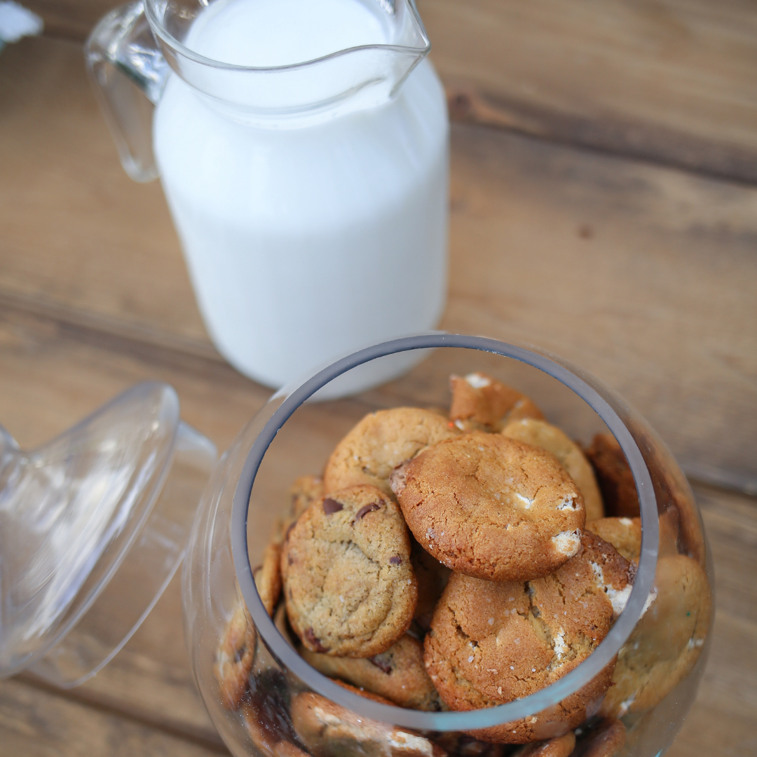 A Guide to Pairing Chocolate Chip Cookies with Milk - Cookies in Jar with Milk