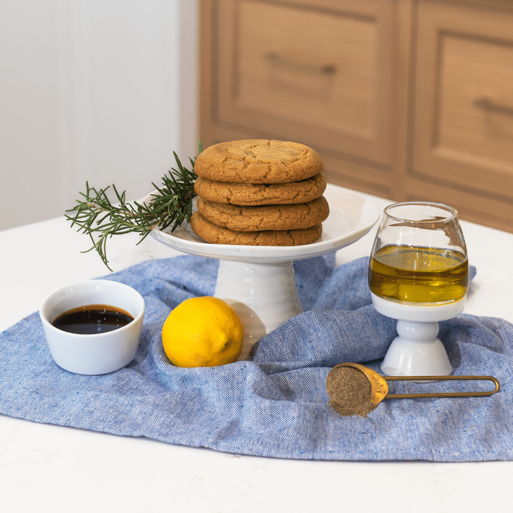Rosemary Balsamic cookies stacked on tray
