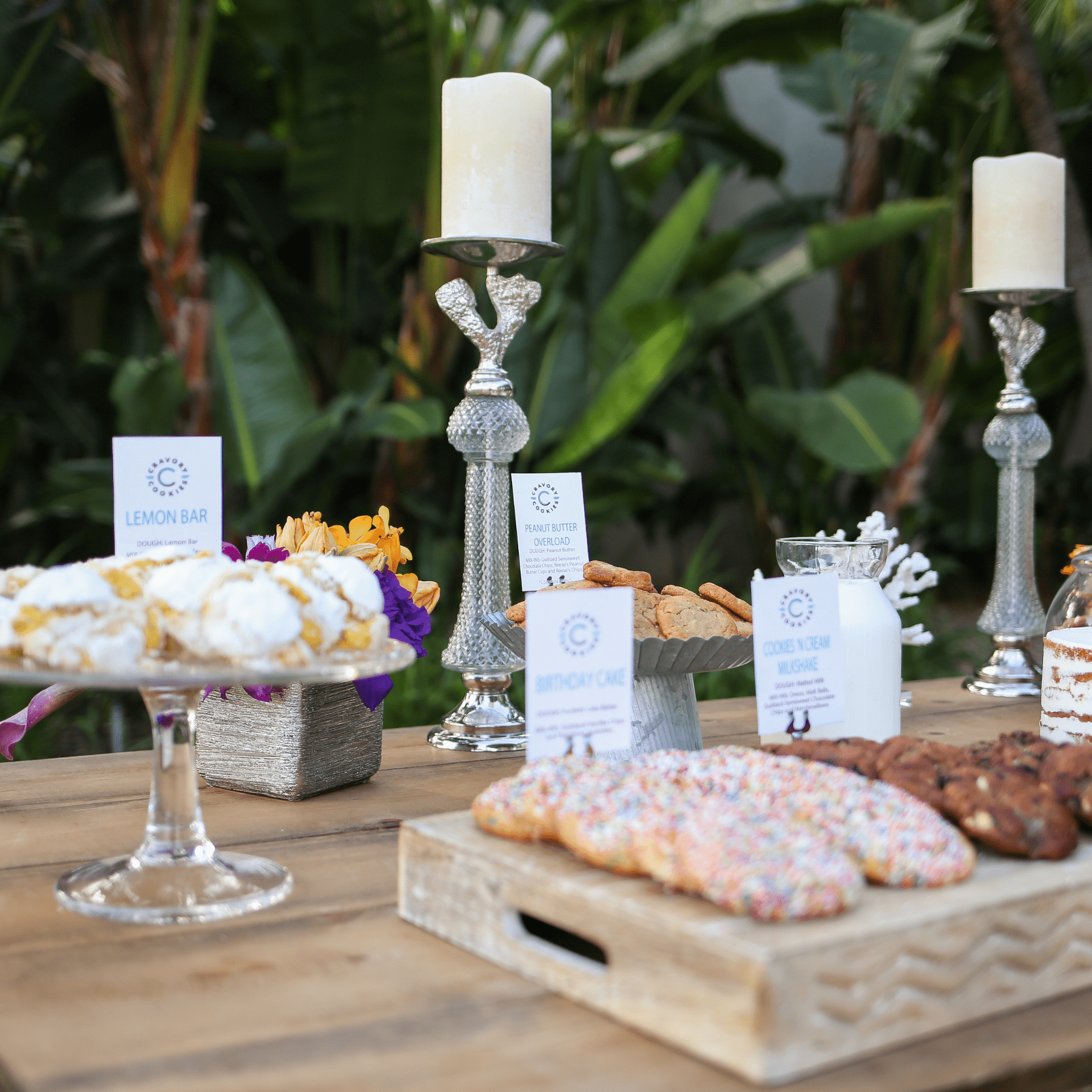 Wedding table with assorted cookies and candles